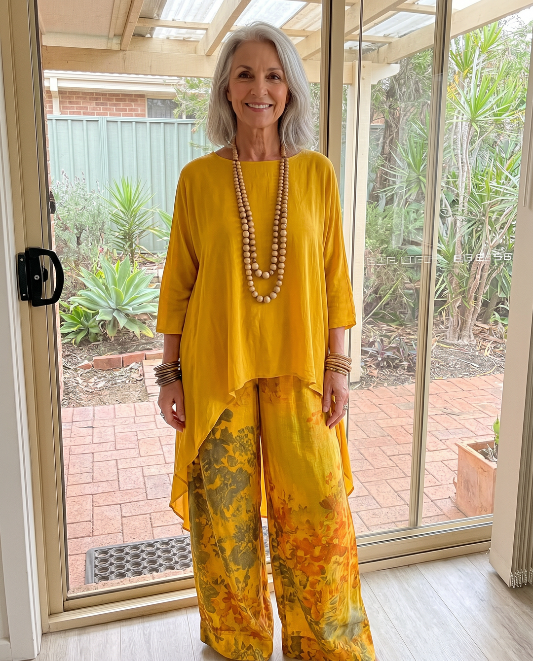 Woman wearing the Fiorella floral two-piece set